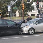 Two damaged cars and drivers at Chamblee intersection