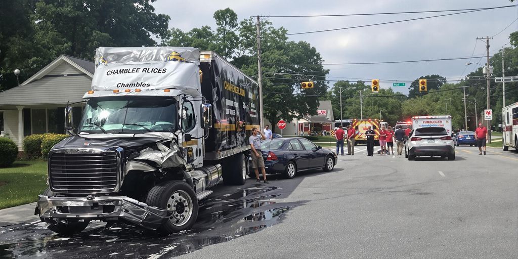 Truck Accident Lawyer. Damaged delivery truck and car after an accident