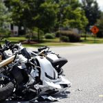 Motorcycle accident scene on a Kennesaw street.