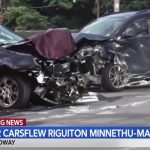 Two cars involved in a collision with a portion of a Kennesaw street visible.