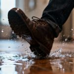 Person slipping on a wet floor.